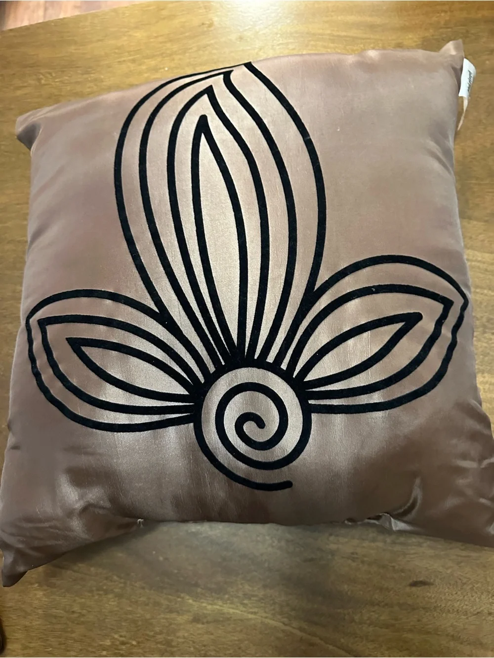 Decorative Throw Pillow with Black Floral Motif on Taupe